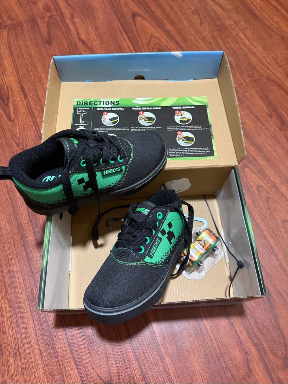 Heelys Kids Black and Green Rolling Sneakers